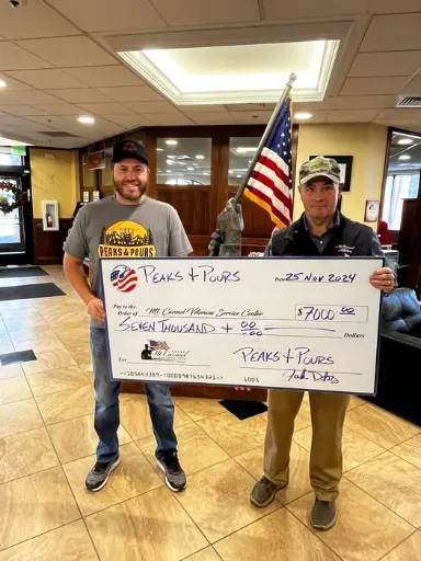Peaks and Pours 2024 check presentation of $7,000 to <a href=